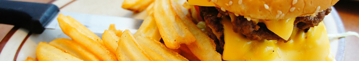 Eating Burger Chicken Wing Sandwich at Buffalo's Reef restaurant in Fort Walton Beach, FL.